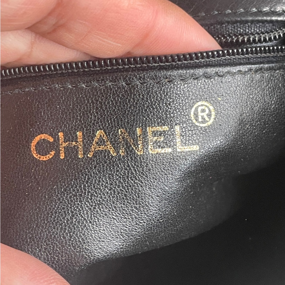 CHANEL Black Quilted Crossbody Bag with Pearl Flower Medallion - Picture 12 of 13